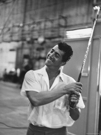 Singer and Actor Dean Martin holding a pitching club on Movie Set for MGM