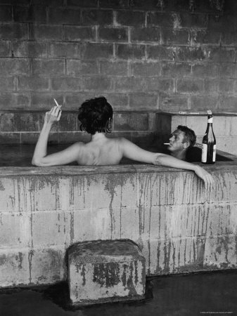 Actor Steve McQueen and Wife Taking Sulfur Bath at Home