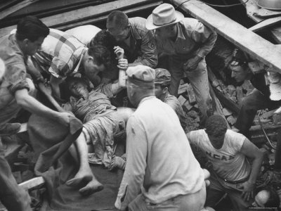 Woman Being Saved from the Wreckage of a Tornado