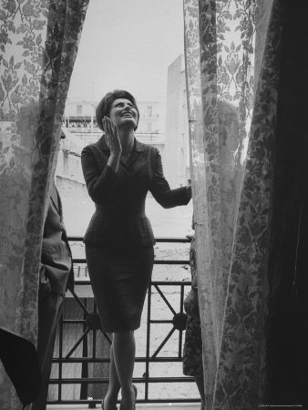 Actress Sophia Loren Chatting with Her Grandfather Domenico Villani and Aunt Dora on the balcony