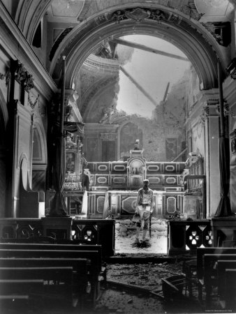 Pvt. Paul Oglesby, 30th Infantry, Standing in Reverence Before Altar in Damaged Catholic Church