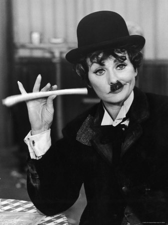 Comedien/Actress Lucille Ball imitating Charlie Chaplin on her New Year
