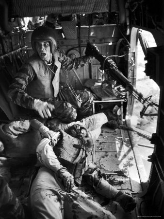 Helicopter Crew Chief James C. Farley Shouting to Crew as Wounded Comrades Lay Dying at His Feet