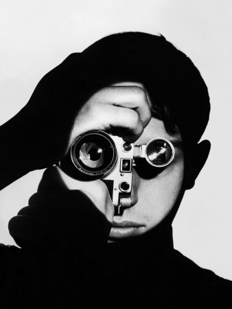 Photographer Dennis Stock Holding Camera to His Face