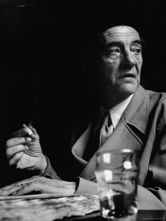 French Painter Maurice Utrillo Seated and Holding Cigarette