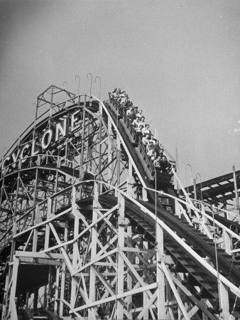 Thrill Seekers at the Top of the Cyclone Roller Coaster at Coney Island Amusement Park