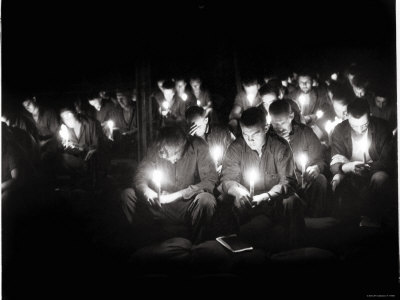 CBS of 50th Battalion Sitting on Sandbags in Canvas, NCB Chapel, in Prayer During Holy Communion