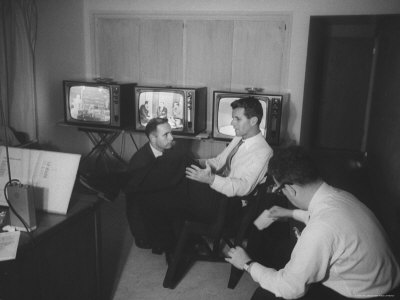 Robert F. Kennedy Talking with Staff Members