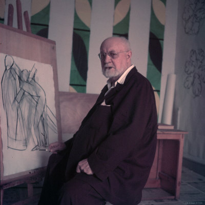 Henri Matisse, Alone, Seated at Easel Displaying One Off His Drawings at His Home in Nice