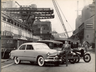Henry Ford II Posing at Ford Plant with Newest Model Ford Car
