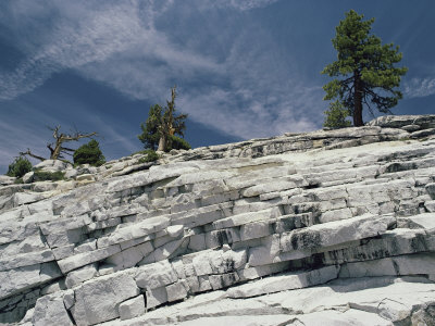 Buy Sheets of Granite, One on Top of the Other in Broken White Slabs, Touch the Sky at AllPosters.com