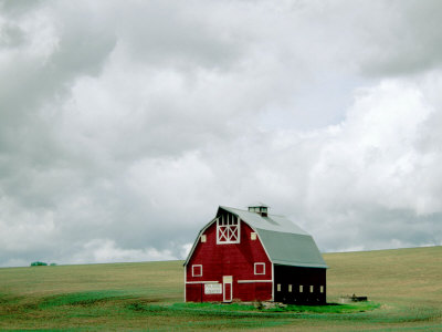 Red Barn Against Cloudy Sky