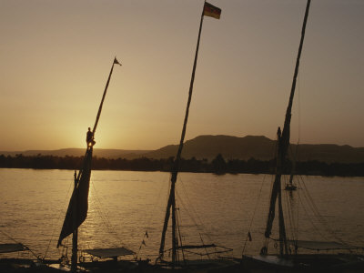 Moored Feluccas on the Nile River at Sunset