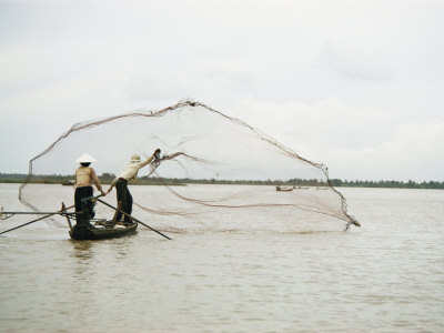 Buy Fishermen Cast out a Net into the Mekong River at AllPosters.com