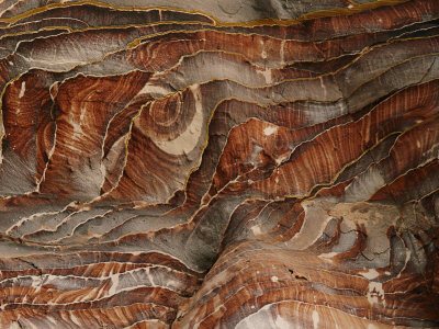 Buy Waves of Natural Color Drift Through a Sandstone Rock Face at AllPosters.com