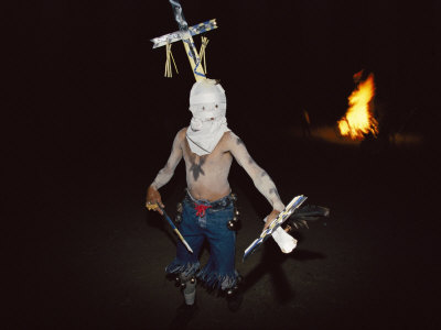 A White Mountain Apache Dances by Firelight in a Puberty Rites Ceremony