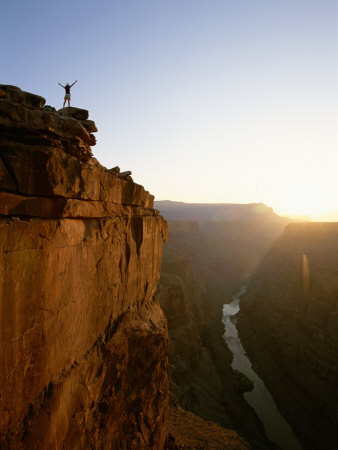 Buy A Hiker Surveys the Grand Canyon from Atop Toroweap Overlook at AllPosters.com