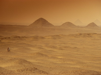 Two Men Cross the Barren Desert at Giza