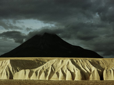 Buy Sheer 100-Foot Cliffs of Eroded Ash Rise Before Mount Katolinat at AllPosters.com