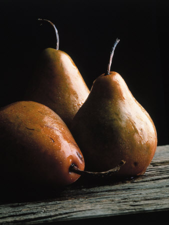 Detailed Image of Three Pears on Wood Surface Poster