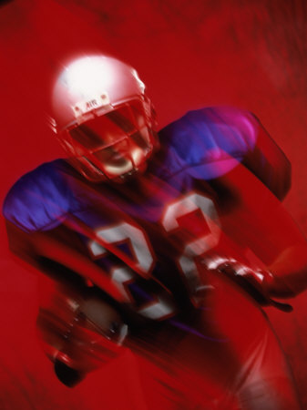 Portrait of an American Football Player Standing in a Tackle Pose Poster