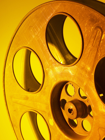Movie Film and Reels in Yellow Light