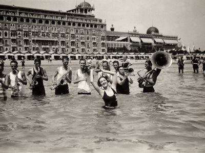 A Group of Musicians Plays in Waist-High Water
