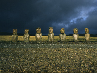 Stone Survivors of a Lost Culture Stare across a Volcanic Landscape