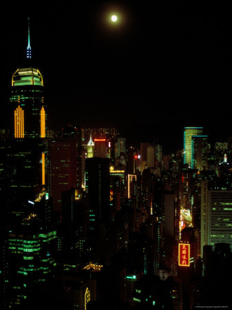 The Moon over the City Lights of Hong Kong