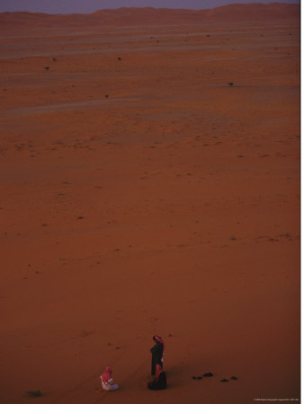 Two Men Meet in the Sand Dunes of the Arabian Desert