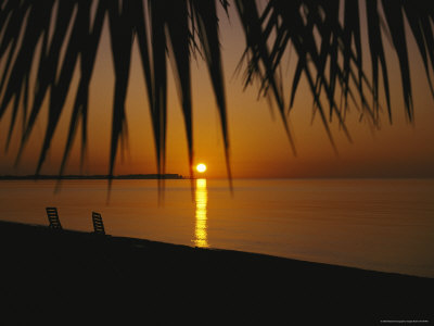 Buy A Setting Sun is Reflected in Waters off of Walkers Cay at AllPosters.com