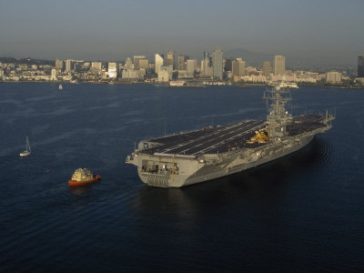 Buy Aircraft Carrier with Skyline of San Diego, California at AllPosters.com