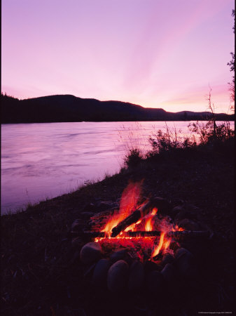 Buy A Campfire Glows on the Banks of the Yukon River at AllPosters.com