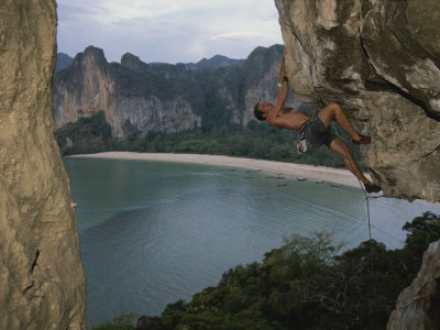 Buy A Climber Negotiates an Overhang on Railay Beach at AllPosters.com