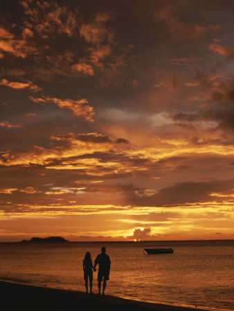 Buy Couple Silhouetted on Beach at Twilight, Belize at AllPosters.com