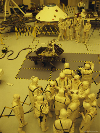 Buy Journalists, Engineers and Technicians Examine a Robot in a Clean Room at AllPosters.com
