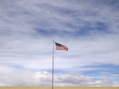 Buy An American Flag Waves in the Breeze at AllPosters.com