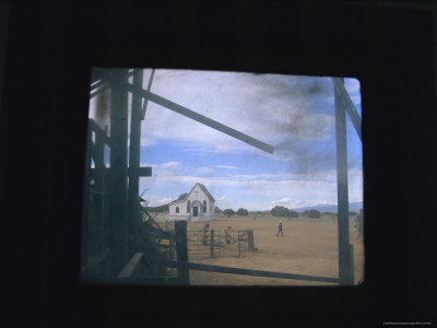 An Old Window Screen Frames This Weathered Western Movie Location