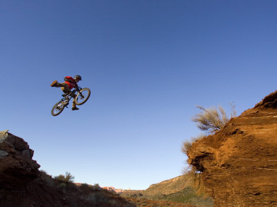 Mountain Biker Catches Air at Rampage Site near Virgin, Utah, USA