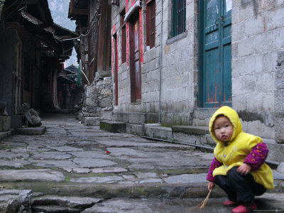 Child Playing on the Street, China