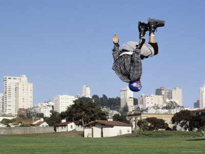 Person Flipping in Mid Air Wearing Inline Skates Poster