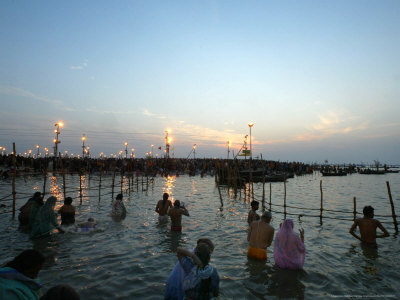 Hindu Devotees Bathe in the River Ganges on a Hindu Festival in Allahabad, India, January 14, 2007