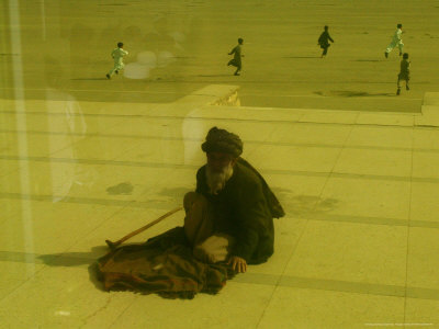 Old Man Rests near the Eid Gah Mosque During Ramadan Eid Prayer, Kabul, Afghanistan, Oct. 23, 2006