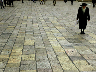 An Orthodox Israeli Jew Walks Across the Plaza Next to the Western Wall