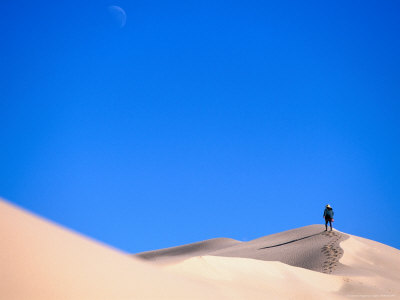 Hiker Trekking Over Sand Dunes Near Lake Mungo, Mungo National Park, Australia