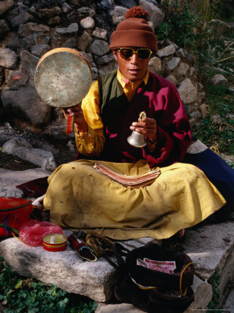 Monk Performing Ritual in Chingdrol Chiling Park, Using Hand-Held Drum and Bell, Lhasa, China