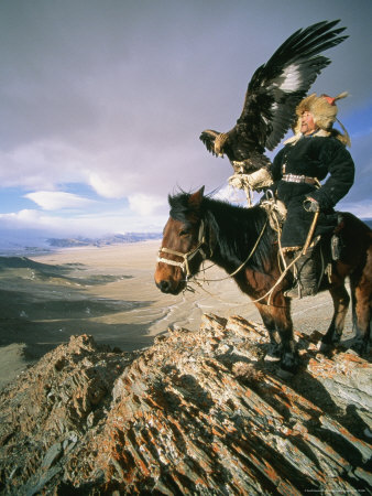 Buy Hunter on Horseback Atop a Hill Holding a Golden Eagle in Mongolia at AllPosters.com