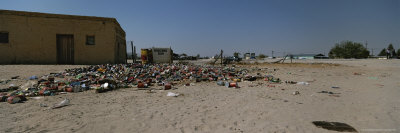 Buy Trash Litters the Ground in Front of a Bar in Namibia at AllPosters.com