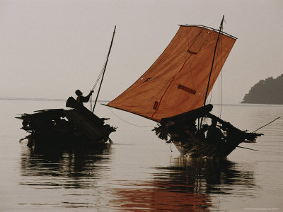 Buy Moken Man Works with Rigging on His Boat Next To Another Boat at AllPosters.com