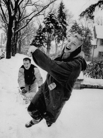 Ginny Nyvall and Charlie Hoag with Group of Youths Sleding, Laughing and Having a Good Time